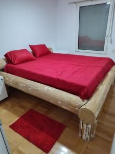 A bed or beds in a room at SKADAr LAKE SARA 3 DM
