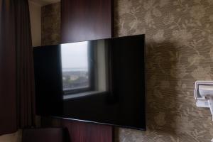 TV a/nebo společenská místnost v ubytování セントラルホテル高萩