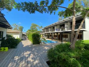 an external view of a building with a walkway at The Stage-Koh Chang in Ko Chang