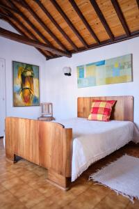 Ένα ή περισσότερα κρεβάτια σε δωμάτιο στο Casa D'Alfaias