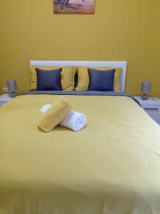 Postel nebo postele na pokoji v ubytování APARTMAN SUNFLOWER