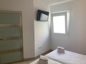 Postel nebo postele na pokoji v ubytování Hostal Tarifa -Recepcion abierta las 24h-