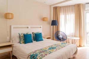 Postel nebo postele na pokoji v ubytování Hotel Aubí