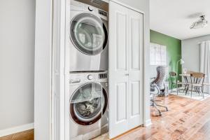 a laundry room with two washer and dryer at Happy Valley Hideway in Happy Valley