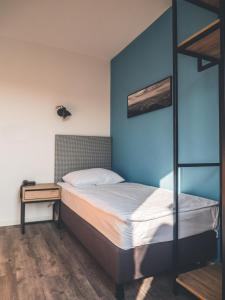 Postel nebo postele na pokoji v ubytování Sabotin, Hotel & Restaurant