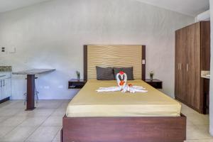 Ένα ή περισσότερα κρεβάτια σε δωμάτιο στο Club Voca #6