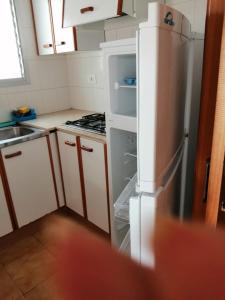 Kuchyň nebo kuchyňský kout v ubytování Coqueto apartamento