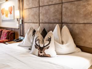 Ένα ή περισσότερα κρεβάτια σε δωμάτιο στο Hotel Hubertushof