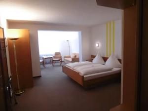 Lova arba lovos apgyvendinimo įstaigoje Hotel Garni Schick