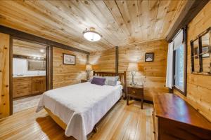 Postel nebo postele na pokoji v ubytování 6 Cluster Cabin