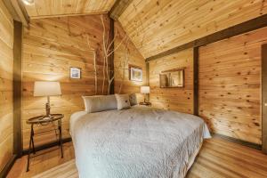 Postel nebo postele na pokoji v ubytování 6 Cluster Cabin