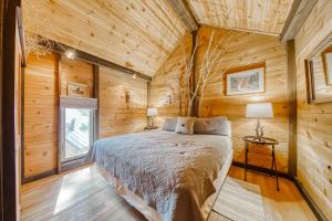 Postel nebo postele na pokoji v ubytování 6 Cluster Cabin