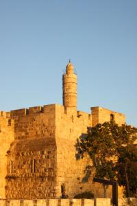 a castle with a chimney on top of it at Lev Yerushalayim Hotel in Jerusalem