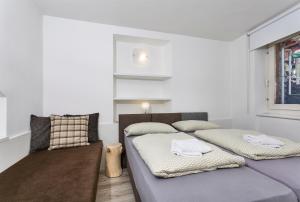 Postel nebo postele na pokoji v ubytování Residenza Al Cadin