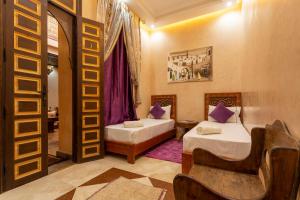 Postel nebo postele na pokoji v ubytování Riad Alice Terrace & Spa