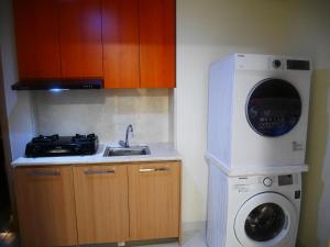 Kuchyň nebo kuchyňský kout v ubytování Fairview House apartment karawaci