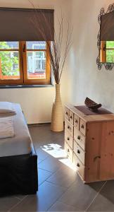 Llit o llits en una habitació de Ferienwohnung Strata Montana