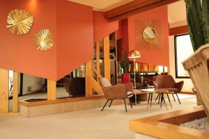 Posezení v ubytování Logis Hostellerie D'Aussois