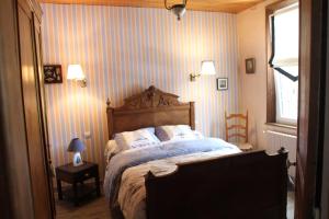 เตียงในห้องที่ Maison favieres baie de Somme