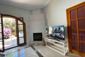 Μια τηλεόραση ή/και κέντρο ψυχαγωγίας στο Villa Cana