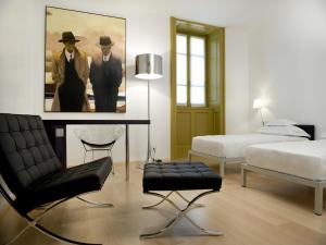 Postel nebo postele na pokoji v ubytování Petronilla - Hotel In Bergamo