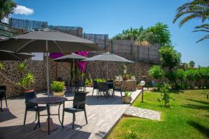 Ein Garten an der Unterkunft Hotel Villa Rita