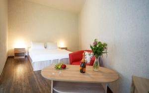 Rúm í herbergi á Hotel Fit Fun