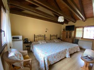 Säng eller sängar i ett rum på Casa Rural Era de Ferro