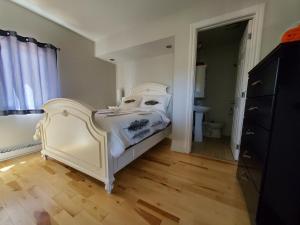 Voodi või voodid majutusasutuse Gite La Bergeronnette toas