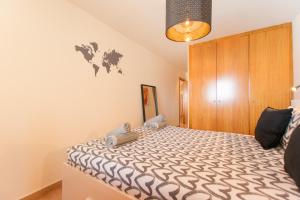 A bed or beds in a room at Duplex Paraiso Dream - TENESOL RENTALS