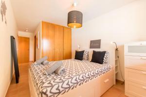 A bed or beds in a room at Duplex Paraiso Dream - TENESOL RENTALS