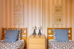 A bed or beds in a room at Duplex Paraiso Dream - TENESOL RENTALS