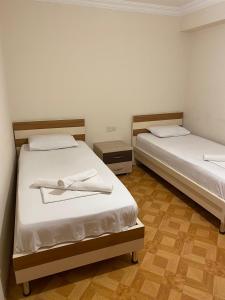 Postel nebo postele na pokoji v ubytování Hotel Tao