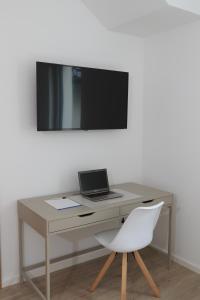 TV a/nebo společenská místnost v ubytování Modern Home Check-in & chill down auf 65 qm²