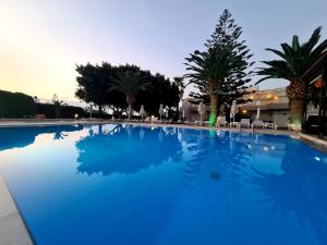 Bazén v ubytování Abella Hotel nebo v jeho okolí