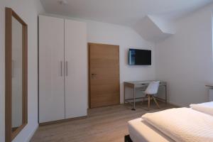 Postel nebo postele na pokoji v ubytování Modern Home Check-in & chill down auf 65 qm²