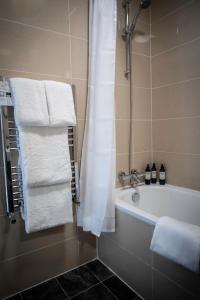 A bathroom at Karma Salford Hall Hotel 