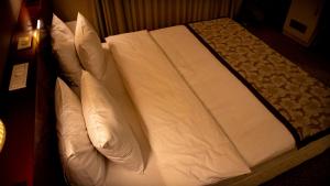 Postel nebo postele na pokoji v ubytování Trakya City Hotel