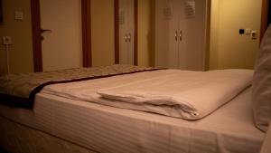 Postel nebo postele na pokoji v ubytování Trakya City Hotel