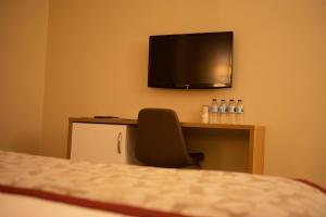 TV a/nebo společenská místnost v ubytování Trakya City Hotel