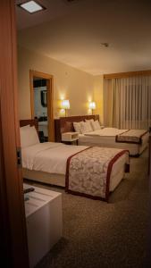 Postel nebo postele na pokoji v ubytování Trakya City Hotel