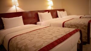 Postel nebo postele na pokoji v ubytování Trakya City Hotel