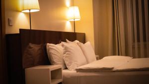 Postel nebo postele na pokoji v ubytování Trakya City Hotel