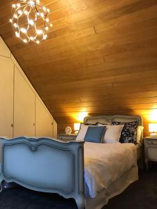 Ένα ή περισσότερα κρεβάτια σε δωμάτιο στο Ferienhaus Chalet Dr. Winkler