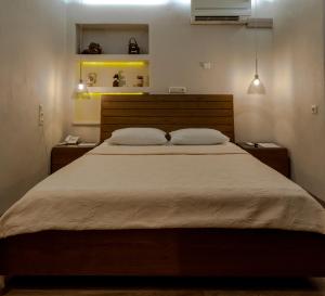 Postel nebo postele na pokoji v ubytování Hotel Meteora