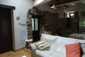 Posezení v ubytování Casa rural en Asturias a orillas del río Narcea puerta de Somiedo