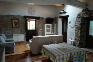 Posezení v ubytování Casa rural en Asturias a orillas del río Narcea puerta de Somiedo