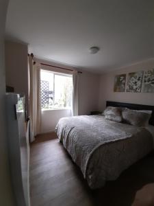 Postel nebo postele na pokoji v ubytování habitac privada Bed n Bkf Patagonia Norte - Puerto Varas Homestay - BnB Plus
