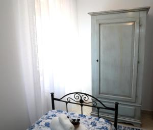 Postel nebo postele na pokoji v ubytování Marsala d'aMare