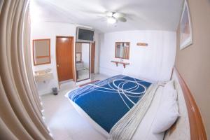 Postel nebo postele na pokoji v ubytování Hotel Niza Zona Piel